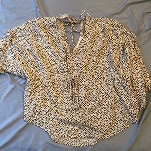 Green & white patterned blouse